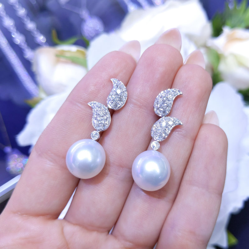 DIER076 Fancy Yellow Diamond Invisible Set Studs in 18K White Gold